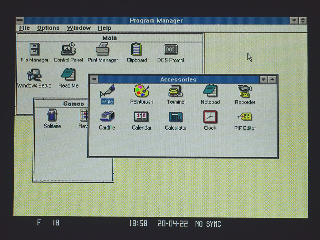 Screenshot of the Windows 3.0 Program Manager window with the Accessories window open.