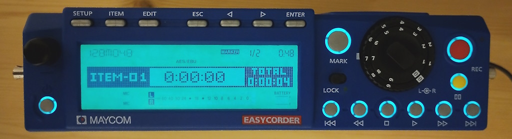 The front of the Easycorder with the display and buttons lit.